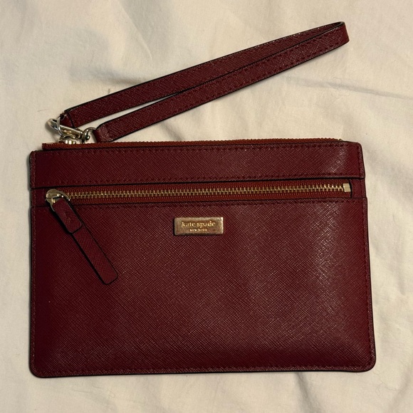 kate spade tinie laurel way burgundy leather wristlet - Picture 1 of 5